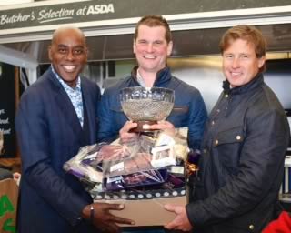 Robin Arnold Balmoral steak competition winner receiving his award from Asda senior meat trader Jim Viggars and chef Ainsley Harriott