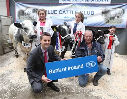 Sponsor William Thompson from Bank of Ireland and judge Jim Sloan with Young Handler First prize winners, Emily Martin, Katrina Killen and Katie McCann.