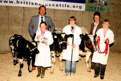 Young Handlers in the 9-12 age group Kerri Simpson 1st Claire Young 2nd and Gemma Hetherington 3rd with judges Kathy Leivers and Jock Wyllie at the Moira Sales rena.
