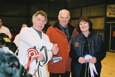 Supreme Champion Exhibitor and breeder Richard Carter with judges Allan and Dierdre Wilkinson.