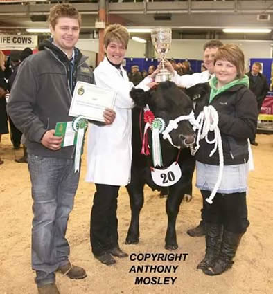 Reserve Supreme Champion of Show - Dylan Hughes - 'Cheeky Girl' (18 months old) - L to R: Dion Hughes (son), Mrs Yvonne Hughes holding trophy with Dylan Hughes, Elin Hughes (daughter).