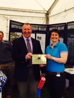 Presentation by Gwyn Williams, to David & Gail Ellis of the Trencrom Herd, winners of the Premier Exhibitor Award