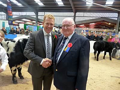 Adam Henson with the judge, Society president Ted Haste