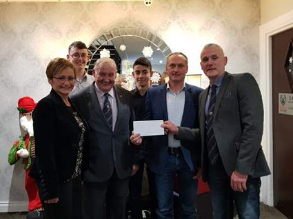 Runners up in the NI British Blue Cattle Club Show Team of the Year competition were the Robinson family from Crossgar, Sam and Elaine with sons Christopher and Matthew. Adding their congratulations are Club President and sponsor Johnny Young, third left, from Ballynahinch and club chair Basil Dougherty, right, from Kircubbin.