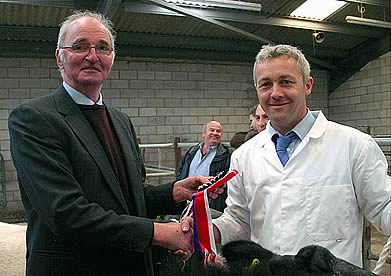 Judge John Hall awards the Supreme Championship to Frank Page