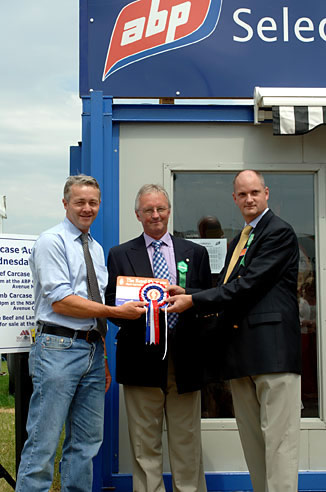 Frank page recieves his Championship prize for the Carcase competition at the Royal