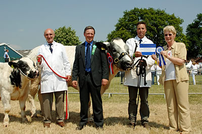 Andrew Craig picks up his Reserve Championship at the Royal Show, with Woodview sal, and Judge, Grahame Brindley